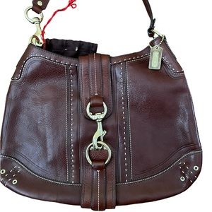 Authentic barely used Coach brown leather saddle bag. EUC, comes with dust bag